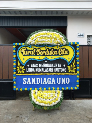 Papan Bunga Duka di Dolo Selatan